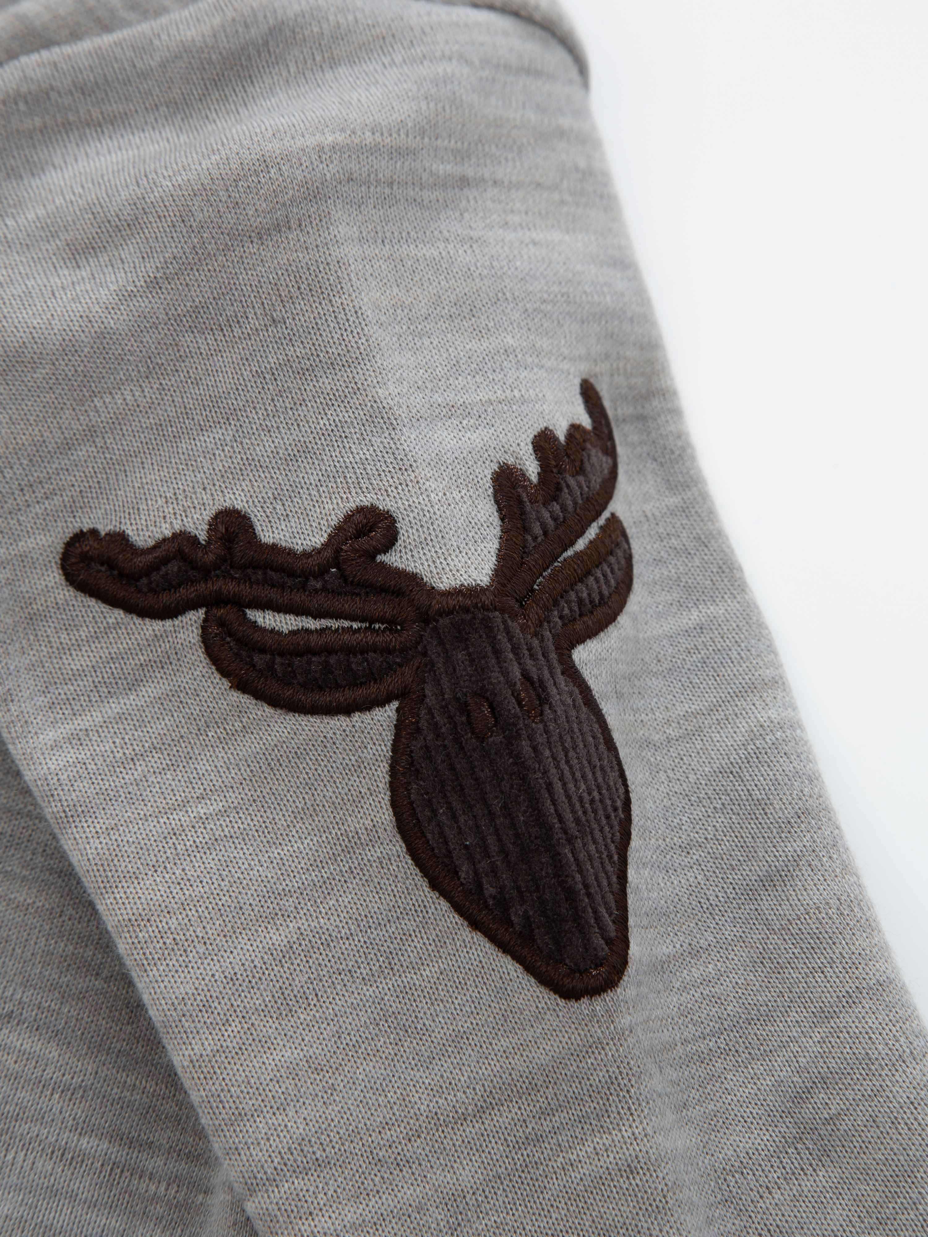 Bergen Merino Ullbody 0-3 år Sand Melange